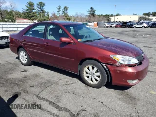 2004 Toyota Camry LE with VIN 4T1BE30KX4U297754, listed as a Copart auction lot 50795425 with 184,152 mi miles and Salvage Title. Bid and sale history available at DreamBid. Image 4.