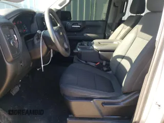 2021 Chevrolet Silverado 1500 Custom with VIN 1GCRWBEK0MZ188967, listed as a Copart auction lot 87637995 with 104,744 mi miles and Salvage Title. Bid and sale history available at DreamBid. Image 7.