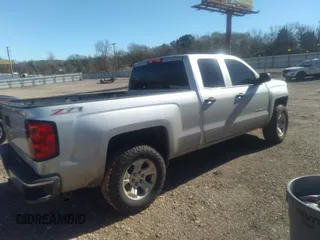 2014 Chevrolet Silverado 1500 LT with VIN 1GCVKREC7EZ120159, listed as a IAAI auction lot 41191282 with 206,836 mi miles and . Bid and sale history available at DreamBid. Image 4.