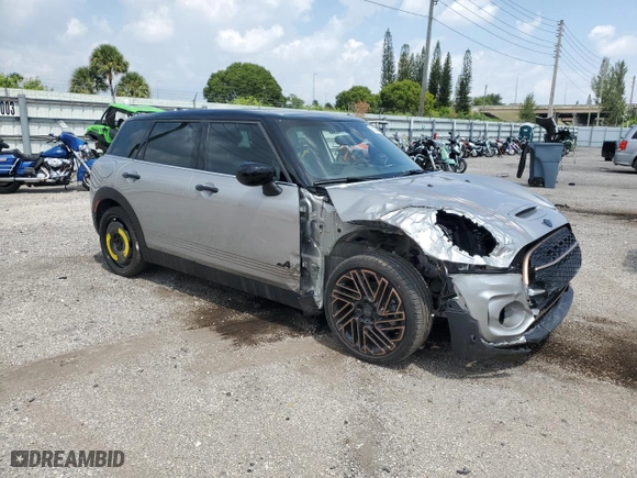 2024 MINI Clubman Cooper S with VIN WMWXJ1C01R2V12216, listed as a Copart auction lot 68257044 with 7,339 mi miles and Salvage Title. Bid and sale history available at carsss.com. Image 4.