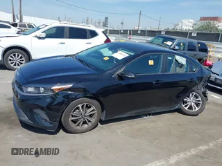 2023 Kia Forte LXS with VIN 3KPF24AD8PE512846, listed as a IAAI auction lot 41858576 with Not Provided miles and . Bid and sale history available at DreamBid. Image 14.