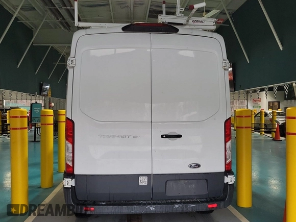 2018 Ford Transit with VIN 1FTYE1CM2JKB28142, listed as a IAAI auction lot 42227496 with 105,704 mi miles and . Bid and sale history available at DreamBid. Image 19.
