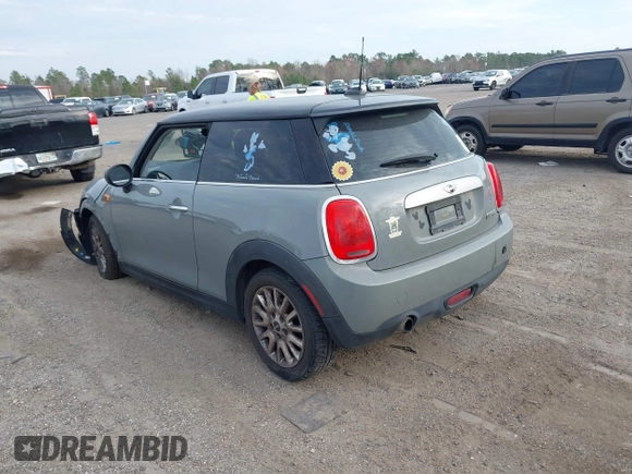 2015 MINI Hardtop with VIN WMWXM5C59F3A58798, listed as a IAAI auction lot 41514988 with 127,771 mi miles and . Bid and sale history available at DreamBid. Image 3.