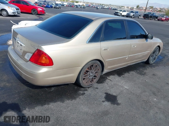 2001 Toyota Avalon XL w/Bucket Seats with VIN 4T1BF28BX1U117793, listed as a IAAI auction lot 42165172 with 247,435 mi miles. Bid and sale history available at carsss.com. Image 4.