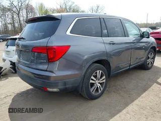2016 Honda Pilot EX-L with VIN 5FNYF6H53GB004091, listed as a IAAI auction lot 42002063 with 173,009 mi miles. Bid and sale history available at carsss.com. Image 4.
