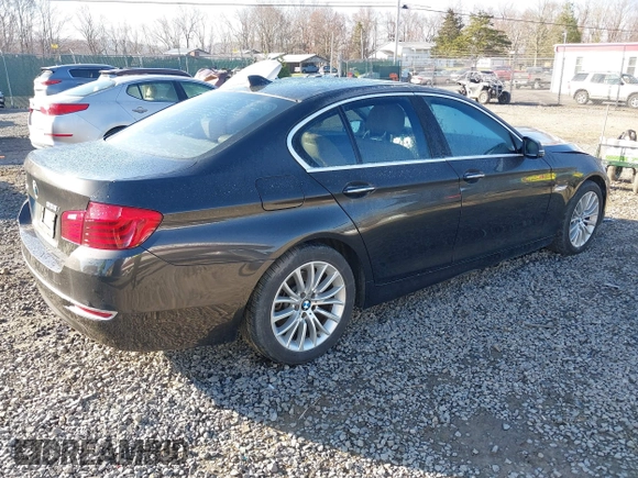 2014 BMW 5 Series 528i xDrive with VIN WBA5A7C54ED616297, listed as a IAAI auction lot 41877809 with 147,874 mi miles and . Bid and sale history available at DreamBid. Image 4.