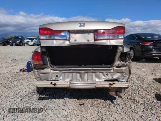 2001 Honda Accord LX z VIN JHMCG554X1C024855, wystawiony jako Copart lot #57649815 z przebiegiem 164 959 mil mil oraz Szkoda całkowita • Salvage title. Historia ofert i sprzedaży dostępna na DreamBid. Obrazek 6.