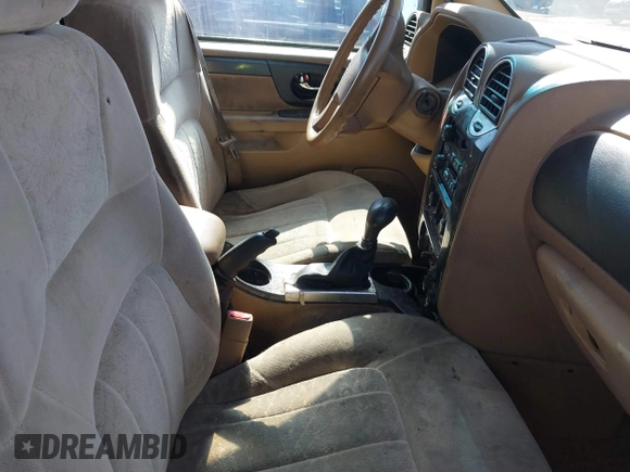 2002 GMC Envoy SLT с VIN 1GKDT13SX22290996, выставлен на аукционе IAAI как лот 42398689 с пробегом 146 987 миль миль и . История ставок и продаж доступна на DreamBid. Изображение 5.