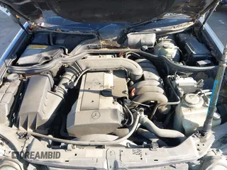 1997 Mercedes-Benz E 320 with VIN WDBJF55F7VA402305, listed as a IAAI auction lot 41865470 with 210,577 mi miles and . Bid and sale history available at DreamBid. Image 10.