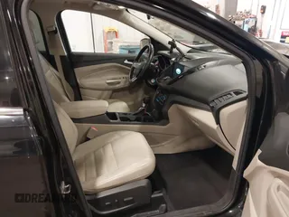 2017 Ford Escape SE with VIN 1FMCU9G98HUD67920, listed as a IAAI auction lot 40937291 with 124,302 mi miles. Bid and sale history available at carsss.com. Image 5.