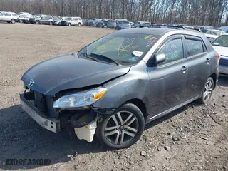 2009 Toyota Matrix S with VIN 2T1LE40E39C001020, listed as a IAAI auction lot 41801991 with 999,999 mi miles. Bid and sale history available at carsss.com. Image 2.
