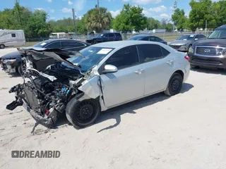 2016 Toyota Corolla L with VIN 5YFBURHE2GP430694, listed as a IAAI auction lot 41899399 with 229,887 mi miles and . Bid and sale history available at DreamBid. Image 2.