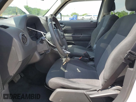 2014 Jeep Patriot Sport with VIN 1C4NJPBA1ED618087, listed as a Copart auction lot 62138265 with 113,914 mi miles and Non repairable. Bid and sale history available at DreamBid. Image 7.