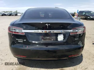 2016 Tesla Model S 90D с VIN 5YJSA1E26GF167934, выставлен на аукционе Copart как лот 57664115 с пробегом 151 583 миль миль и Списание • Salvage title. История ставок и продаж доступна на DreamBid. Изображение 6.