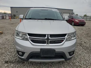 2012 Dodge Journey SXT with VIN 3C4PDDBG4CT297642, listed as a Copart auction lot 57636895 with 226,992 mi miles and Clean title. Bid and sale history available at DreamBid. Image 5.