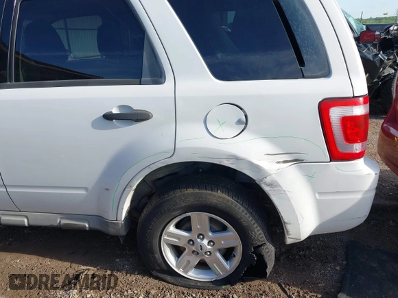 2009 Ford Escape Hybrid with VIN 1FMCU49399KC19803, listed as a IAAI auction lot 42004776 with 163,353 mi miles and . Bid and sale history available at DreamBid. Image 6.