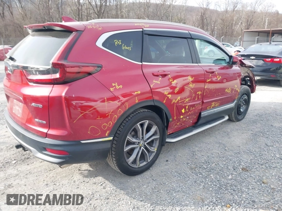 2020 Honda CR-V Touring with VIN 2HKRW2H90LH649017, listed as a IAAI auction lot 41701827 with 50,565 mi miles and . Bid and sale history available at DreamBid. Image 4.