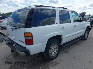 2002 Chevrolet Tahoe Z71 z VIN 1GNEK13Z32R326011, wystawiony jako IAAI lot #42181335 z przebiegiem 315 321 mil mil oraz . Historia ofert i sprzedaży dostępna na DreamBid. Obrazek 4.
