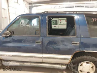 1996 Chevrolet Tahoe with VIN 1GNEK13R3TJ359476, listed as a IAAI auction lot 39579992 with 258,505 mi miles. Bid and sale history available at carsss.com. Image 6.