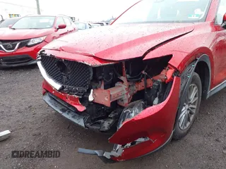 2019 Mazda CX-5 Sport with VIN JM3KFBBM7K1574764, listed as a IAAI auction lot 41276424 with 28,901 mi miles and . Bid and sale history available at carsss.com. Image 6.