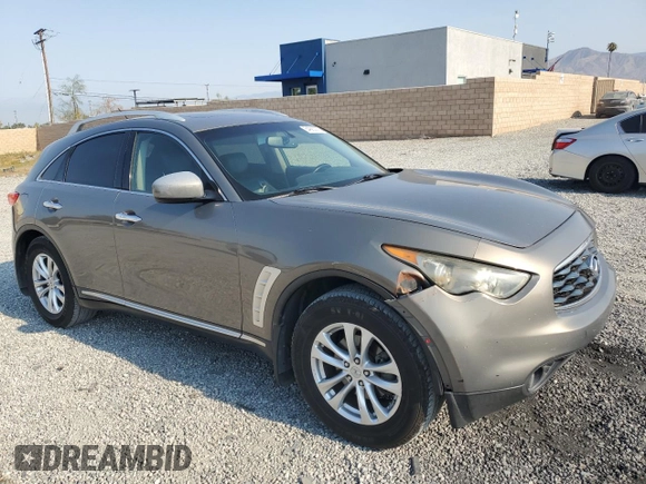 2010 Infiniti FX with VIN JN8AS1MW7AM851892, listed as a Copart auction lot 64990275 with 125,266 mi miles and Salvage title. Bid and sale history available at DreamBid. Image 4.