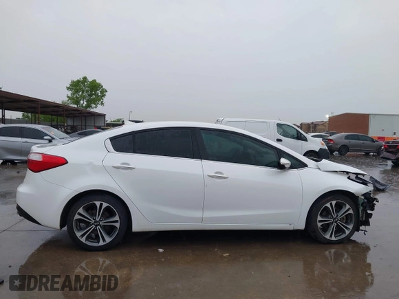 2016 Kia Forte EX with VIN KNAFX4A82G5450616, listed as a IAAI auction lot 42107042 with 131,419 mi miles. Bid and sale history available at carsss.com. Image 14.