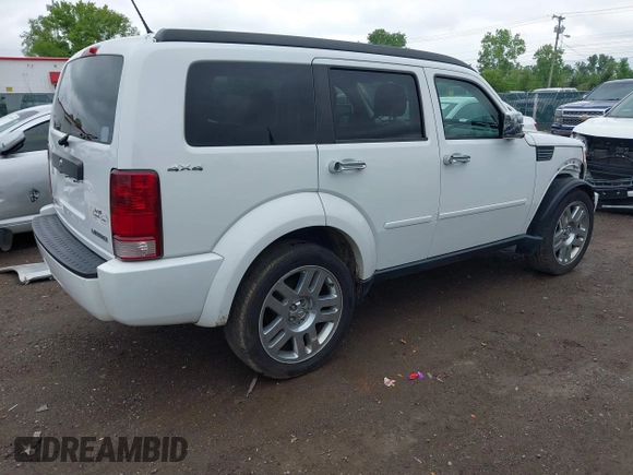 2011 Dodge Nitro Heat z VIN 1D4PU4GK7BW598432, wystawiony jako IAAI lot #42252036 z przebiegiem 148 329 mil mil oraz . Historia ofert i sprzedaży dostępna na DreamBid. Obrazek 4.