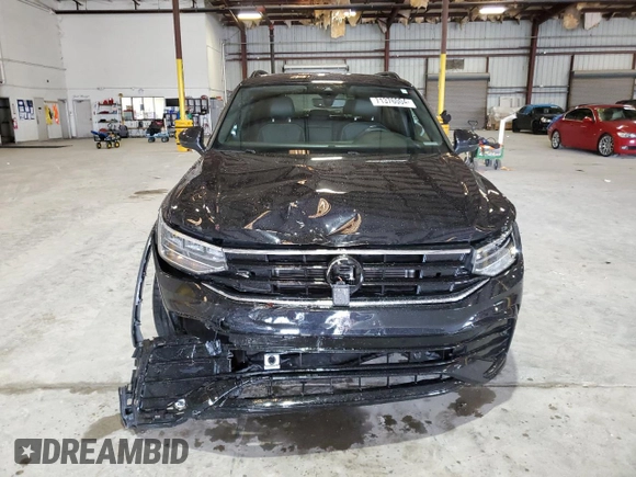 2022 Volkswagen Tiguan SE R-Line Black with VIN 3VVCB7AX1NM140818, listed as a Copart auction lot 71376004 with 29,190 mi miles and Salvage title. Bid and sale history available at DreamBid. Image 5.