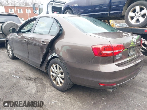 2015 Volkswagen Jetta Sedan 1.8T SE with VIN 3VWD17AJ2FM403107, listed as a IAAI auction lot 41849921 with 103,990 mi miles. Bid and sale history available at carsss.com. Image 3.