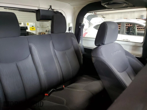 2013 Jeep Wrangler Rubicon 10th Anniversary z VIN 1C4BJWCGXDL543958, wystawiony jako Copart lot #58492255 z przebiegiem 94 455 mil mil oraz Szkoda całkowita • Salvage title. Historia ofert i sprzedaży dostępna na DreamBid. Obrazek 10.
