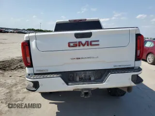 2020 GMC Sierra 2500HD Denali z VIN 1GT49REY1LF225393, wystawiony jako Copart lot #52556145 z przebiegiem Nie podano mil oraz Szkoda całkowita • Salvage title. Historia ofert i sprzedaży dostępna na DreamBid. Obrazek 6.