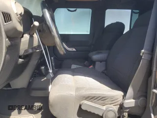2012 Jeep Wrangler Unlimited Call of Duty MW3 with VIN 1C4BJWFGXCL148883, listed as a Copart auction lot 53162705 with 111,900 mi miles and Salvage title. Bid and sale history available at DreamBid. Image 7.