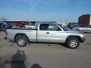 2002 Dodge Dakota with VIN 1B7GL12X62S538389, listed as a IAAI auction lot 41533809 with 159,576 mi miles and . Bid and sale history available at carsss.com. Image 13.
