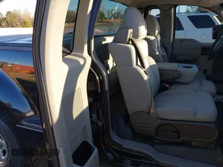2006 Ford F-150 STX with VIN 1FTRF02W56KB73579, listed as a IAAI auction lot 41621690 with 239,770 mi miles. Bid and sale history available at carsss.com. Image 8.