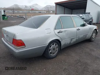 1994 Mercedes-Benz S with VIN WDBGA43E0RA162923, listed as a IAAI auction lot 42012249 with 107,498 mi miles and . Bid and sale history available at DreamBid. Image 4.