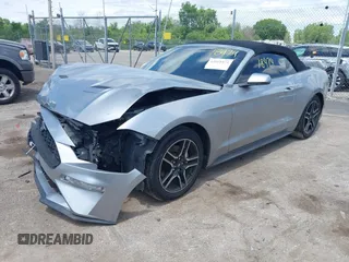 2020 Ford Mustang EcoBoost z VIN 1FATP8UH6L5106537, wystawiony jako IAAI lot #42518474 z przebiegiem 86 971 mil mil oraz . Historia ofert i sprzedaży dostępna na DreamBid. Obrazek 17.