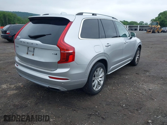 2016 Volvo XC90 T6 Momentum z VIN YV4A22PK9G1070826, wystawiony jako IAAI lot #42471462 z przebiegiem 147 163 mil mil oraz . Historia ofert i sprzedaży dostępna na DreamBid. Obrazek 4.