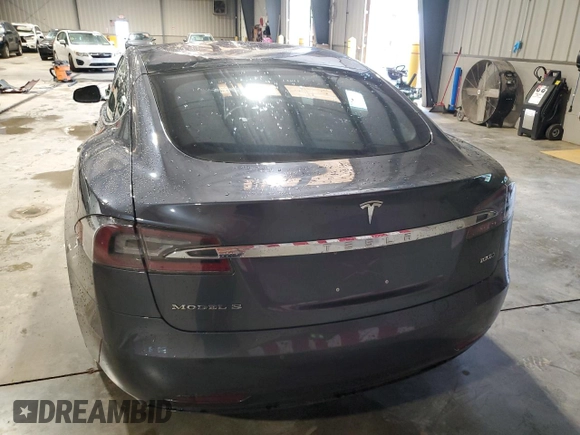 2017 Tesla Model S 100D with VIN 5YJSA1E29HF210731, listed as a Copart auction lot 56762565 with 114,117 mi miles and Salvage title. Bid and sale history available at DreamBid. Image 6.