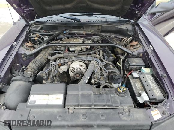 1996 Ford Mustang GT z VIN 1FALP42X8TF196321, wystawiony jako Copart lot #50874885 z przebiegiem 86 945 mil mil oraz Szkoda całkowita • Salvage title. Historia ofert i sprzedaży dostępna na DreamBid. Obrazek 11.