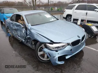 2015 BMW 4 Series 428i xDrive with VIN WBA3T1C58FP820664, listed as a IAAI auction lot 41846954 with 78,013 mi miles and . Bid and sale history available at carsss.com. Image 1.