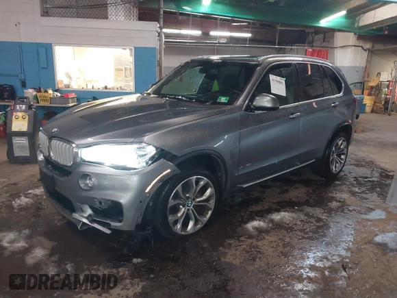 2018 BMW X5 xDrive35i with VIN 5UXKR0C53J0Y03214, listed as a IAAI auction lot 41509082 with 92,552 mi miles. Bid and sale history available at carsss.com. Image 2.