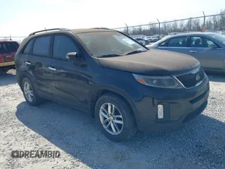 2014 Kia Sorento LX with VIN 5XYKT4A73EG482046, listed as a IAAI auction lot 41811727 with 157,845 mi miles and . Bid and sale history available at carsss.com. Image 1.