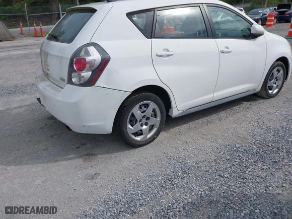 2009 Pontiac Vibe w/1SA with VIN 5Y2SP67879Z448067, listed as a IAAI auction lot 42077553 with 174,648 mi miles. Bid and sale history available at carsss.com. Image 4.