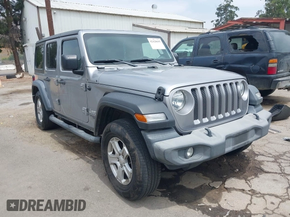 2018 Jeep Wrangler Unlimited Sport S with VIN 1C4HJXDN5JW145340, listed as a IAAI auction lot 42420695 with 92,500 mi miles and . Bid and sale history available at DreamBid. Image 1.
