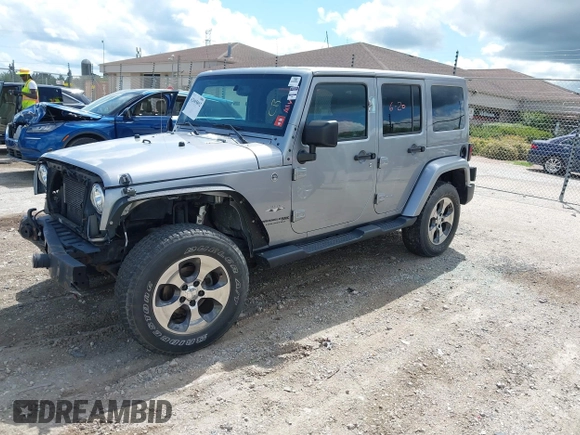 2018 Jeep Wrangler Unlimited Sahara with VIN 1C4BJWEGXJL806832, listed as a IAAI auction lot 42605892 with 90,535 mi miles and . Bid and sale history available at DreamBid. Image 2.