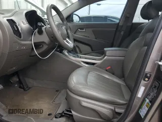 2013 Kia Sportage LX z VIN KNDPB3A25D7508794, wystawiony jako Copart lot #60145865 z przebiegiem 134 503 mil mil oraz Czysty tytuł • Clean title. Historia ofert i sprzedaży dostępna na DreamBid. Obrazek 7.