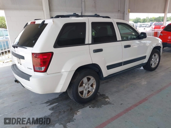 2005 Jeep Grand Cherokee Laredo with VIN 1J4GR48K25C599307, listed as a IAAI auction lot 42705166 with 231,747 mi miles and . Bid and sale history available at DreamBid. Image 4.