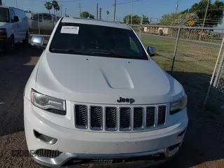 2015 Jeep Grand Cherokee Summit with VIN 1C4RJFJT5FC767687, listed as a IAAI auction lot 42015878 with 1 mi miles. Bid and sale history available at carsss.com. Image 12.