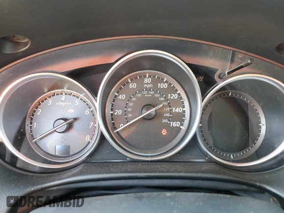 2013 Mazda CX-5 Sport z VIN JM3KE4BEXD0158031, wystawiony jako Copart lot #77827644 z przebiegiem Nie podano mil oraz Szkoda całkowita • Salvage title. Historia ofert i sprzedaży dostępna na DreamBid. Obrazek 9.