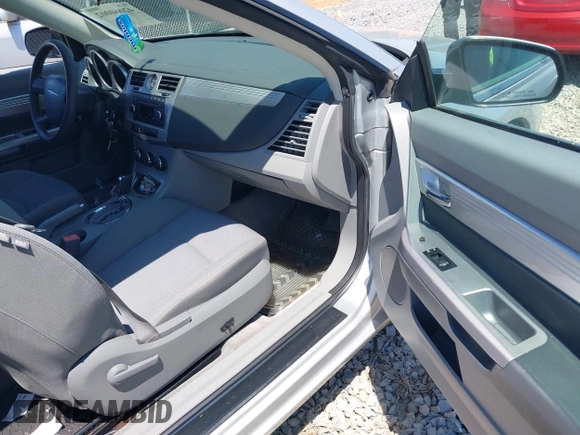 2008 Chrysler Sebring Touring with VIN 1C3LC55R08N279879, listed as a IAAI auction lot 42060002 with 80,133 mi miles and . Bid and sale history available at DreamBid. Image 5.